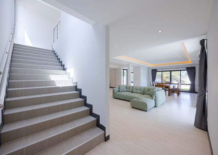 Staircase and living area of a newly built house